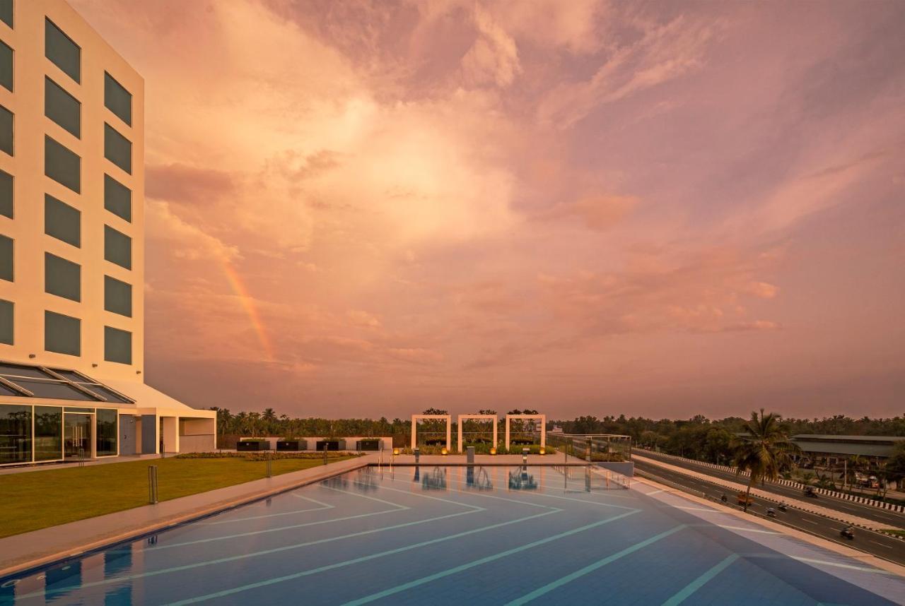 O By Tamara, Trivandrum Thiruvananthapuram Exterior photo The pool at the Infosys Mysuru campus